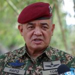 Bekas PTD didakwa lagi tuduhan terima RM145,000 hasil aktiviti haram